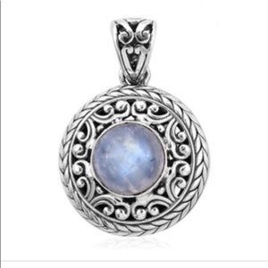 Rainbow moonstone in a .925 setting pendant. Sale!